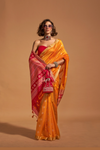 Women Mustard Yellow and Rani Pink geometric contrast pallu Saree