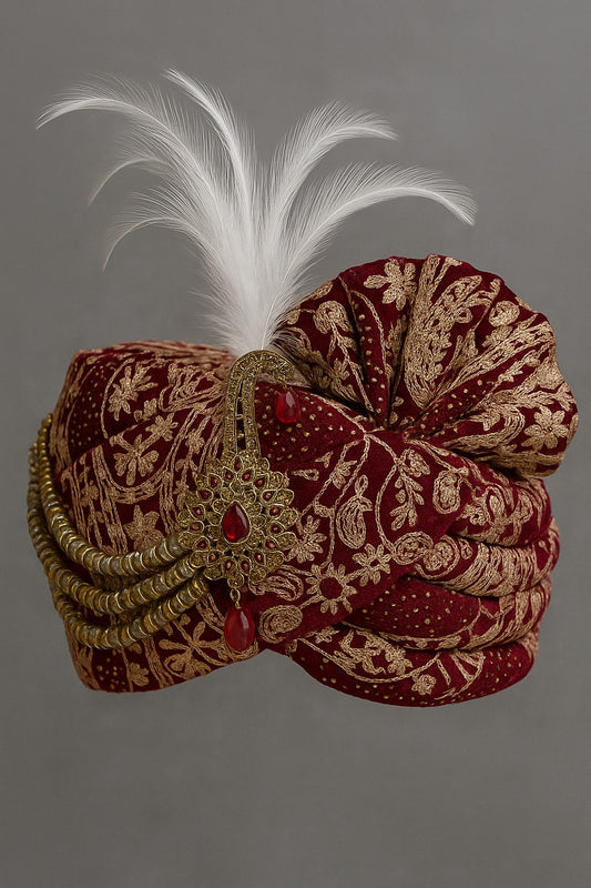 Deep maroon or wine red.Groom Safa with Feather & Stone Brooch