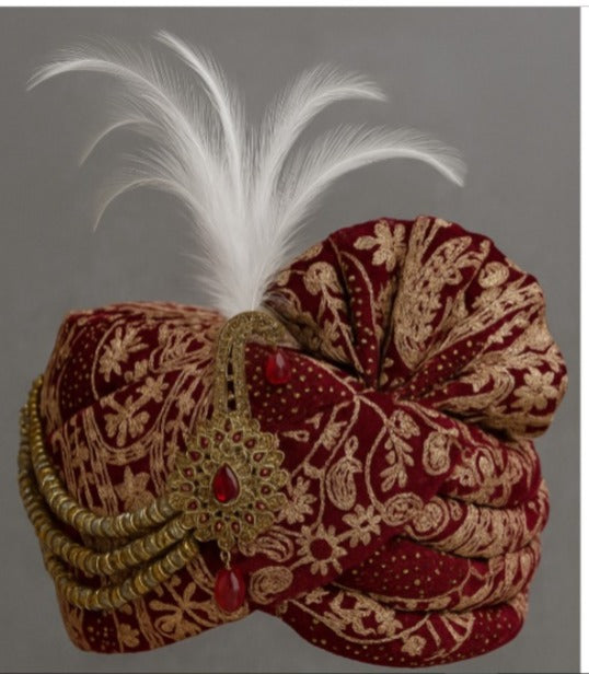 Deep maroon or wine red.Groom Safa with Feather & Stone Brooch